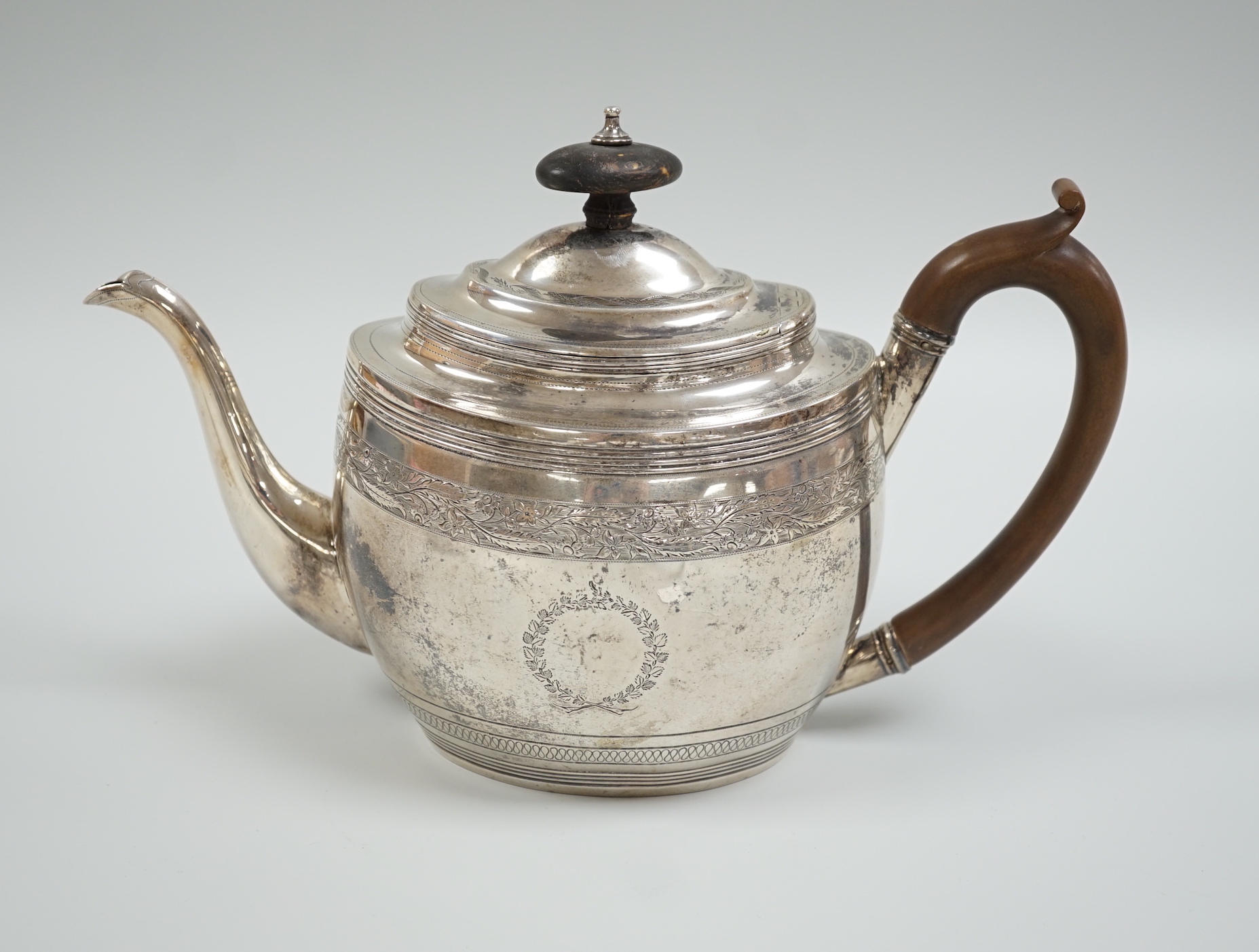 A George III engraved silver oval teapot, Thomas Wallis II?, London, 1802, gross weight 15.5oz.